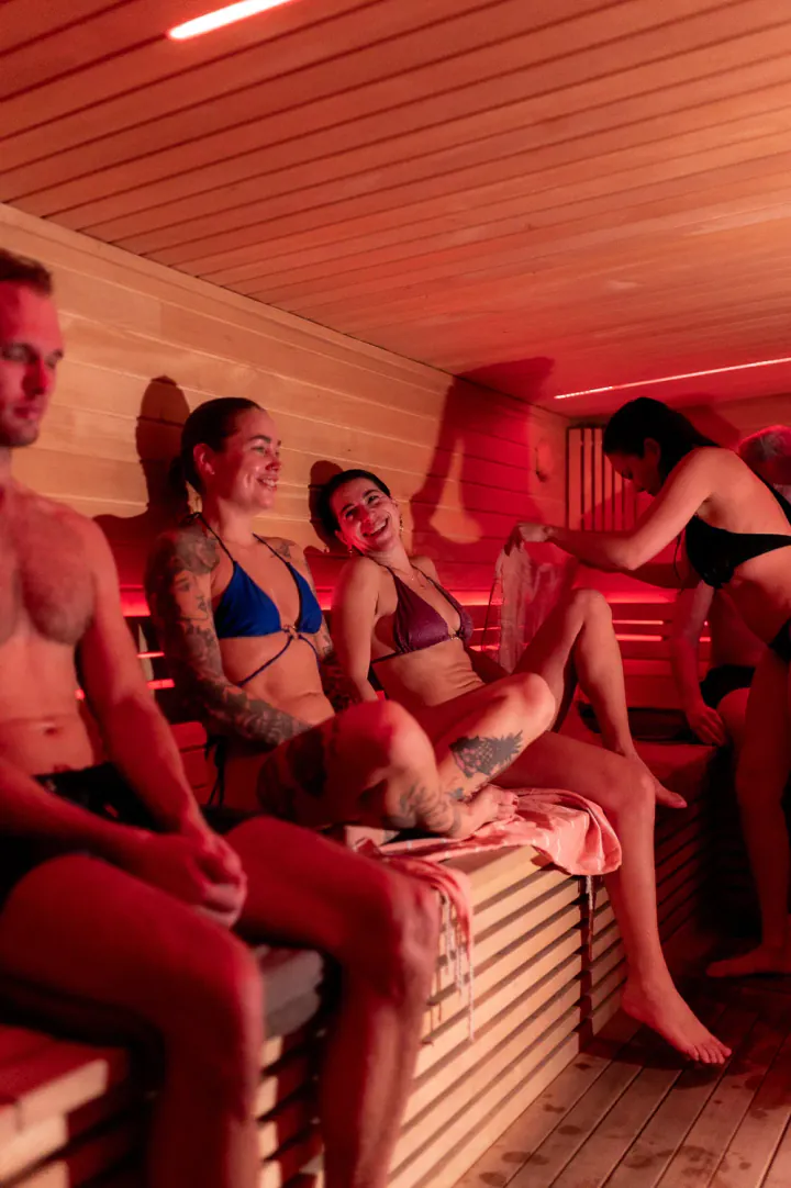 The Sacred Sauna Mood: Guests on the sauna benches at The Sacred Sauna